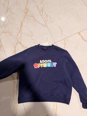 Madhappy Navy Crewneck Sweatshirt with Multicolor 'Local Optimist' Graphic